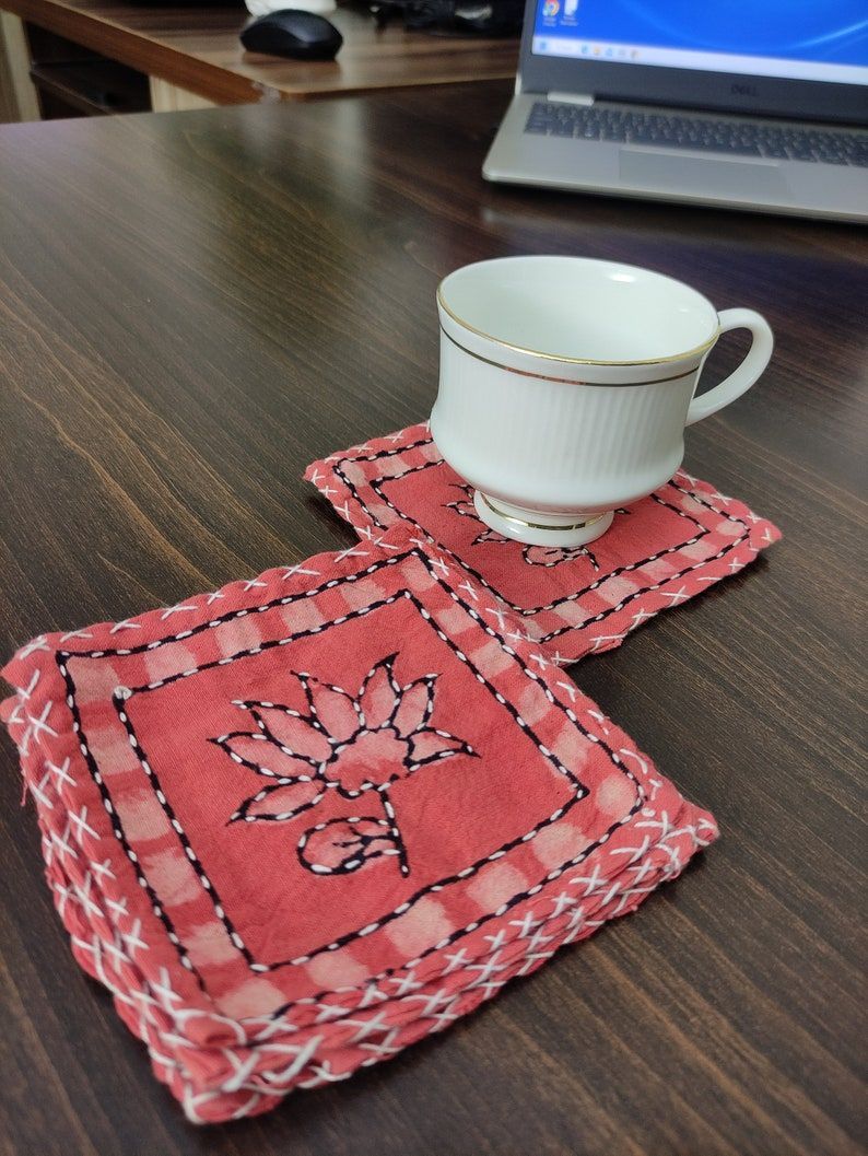 Khan fabric tea coaster with pearl edging